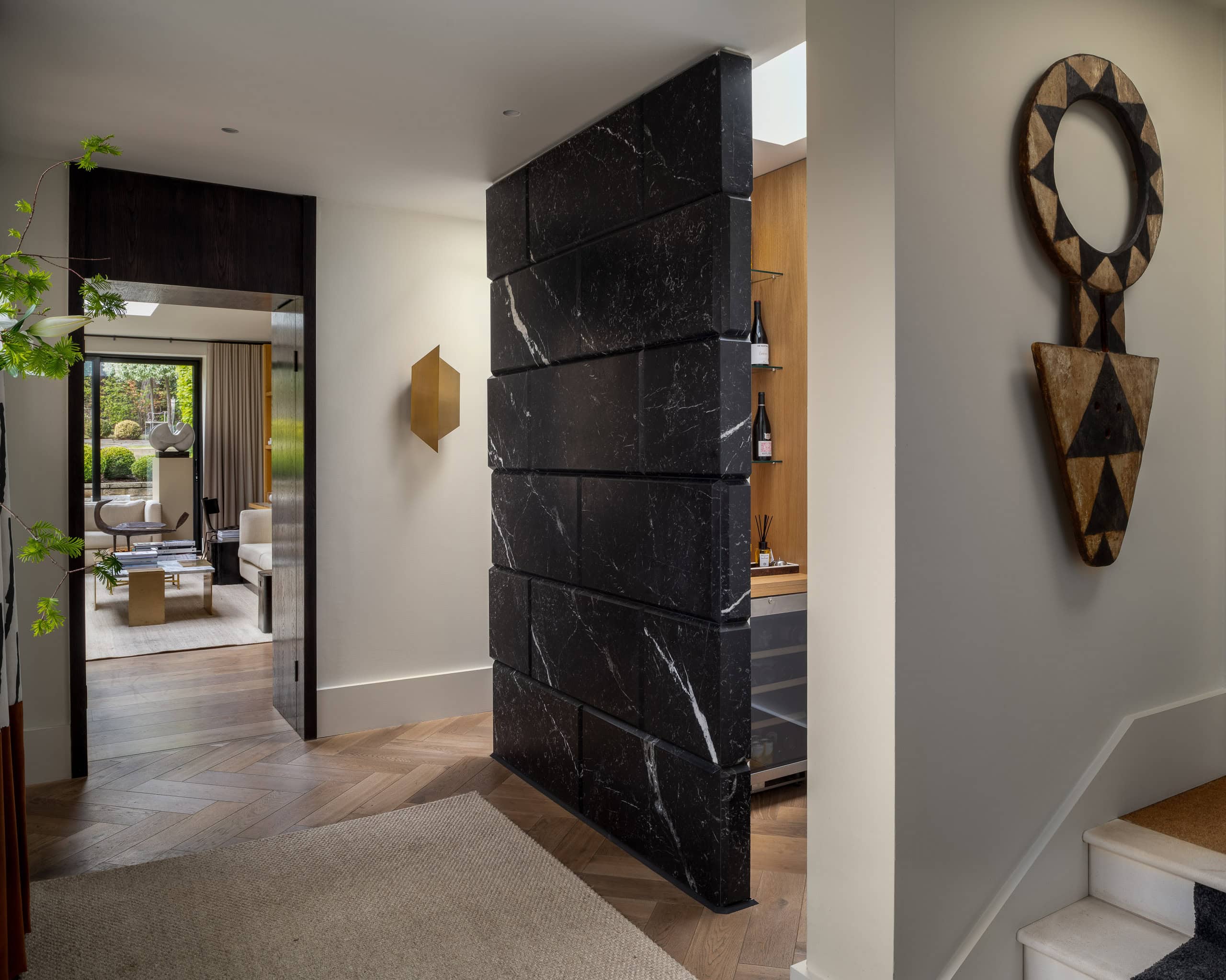 Black marble partition wall in modern home interior, stylish and elegant design element.