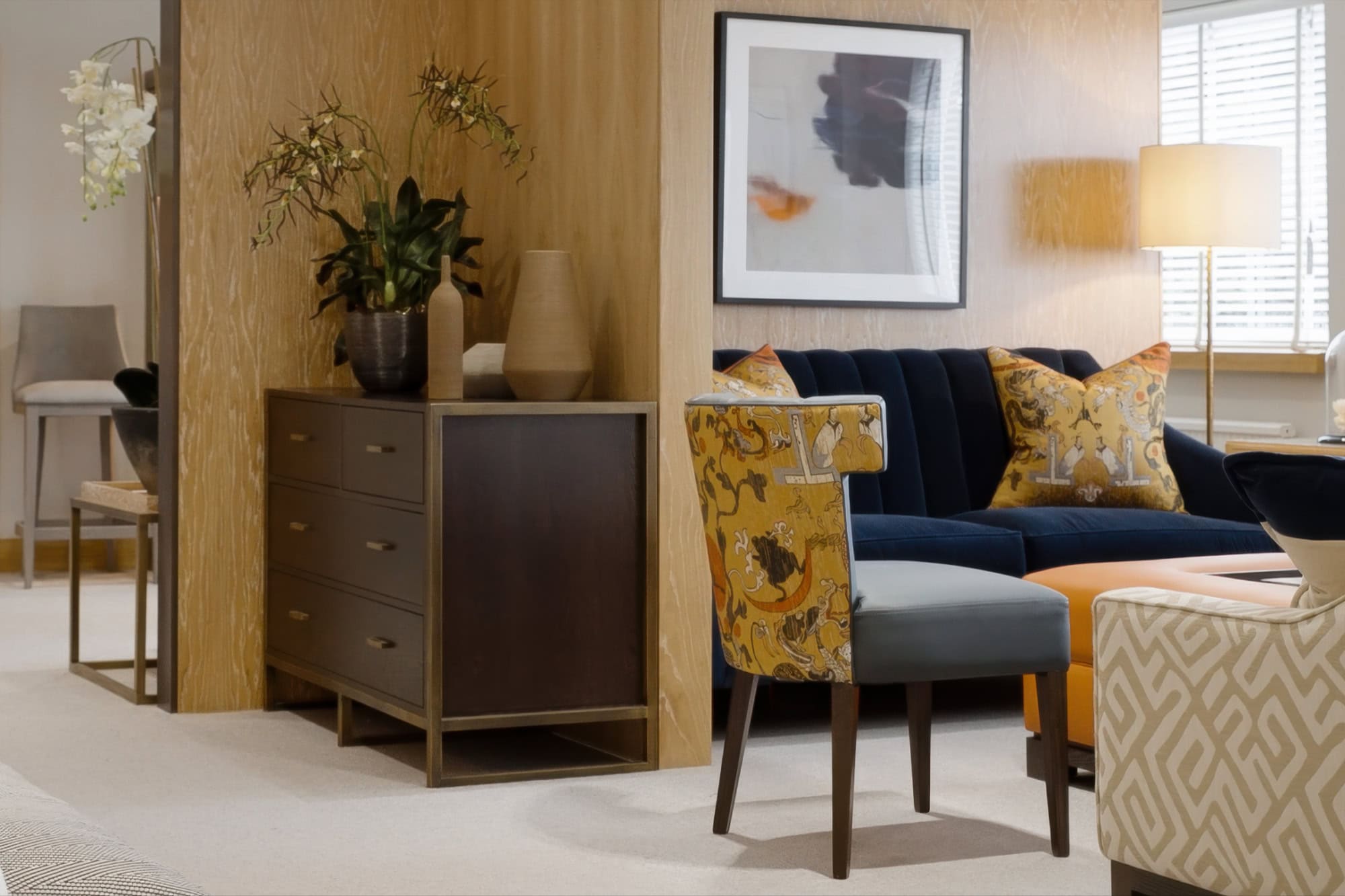 Elegant living room with modern furniture and decorative accents.