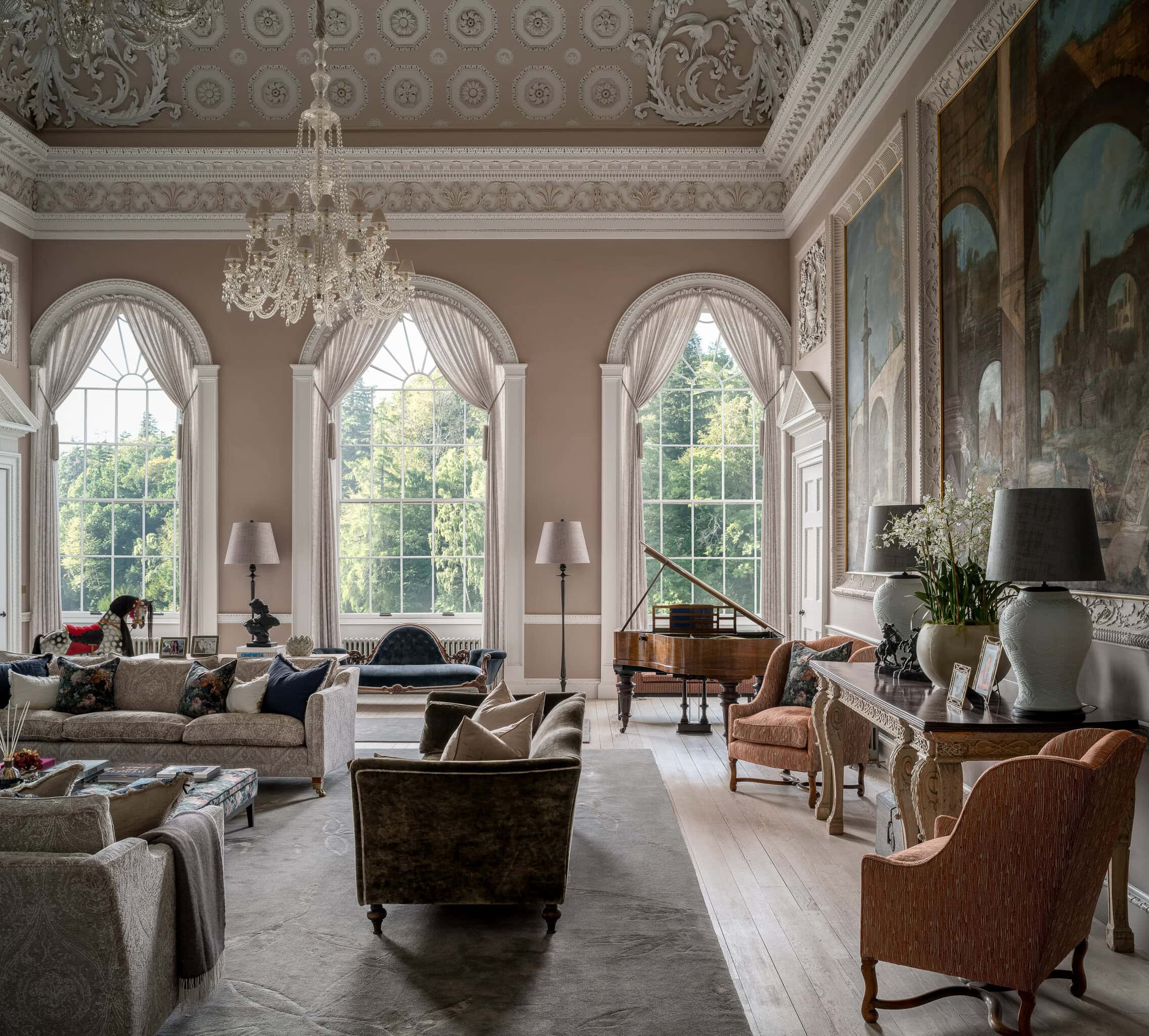 Elegant living room with large windows, classic furniture, and a grand piano, showcasing luxurious i.