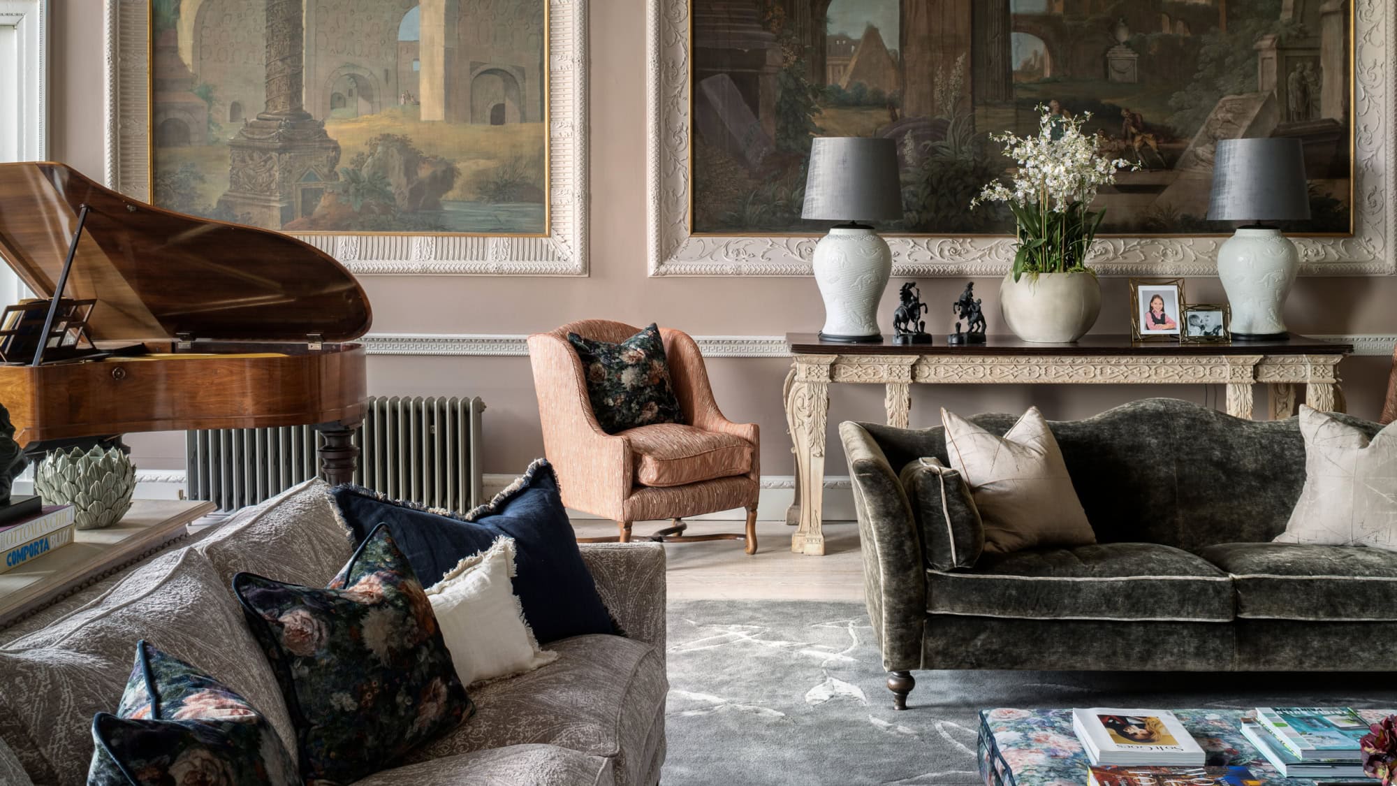 Elegant living room interior at Yester House by Jeffreys Interiors, featuring a grand piano, ornate artwork, velvet seating, and classical detailing.