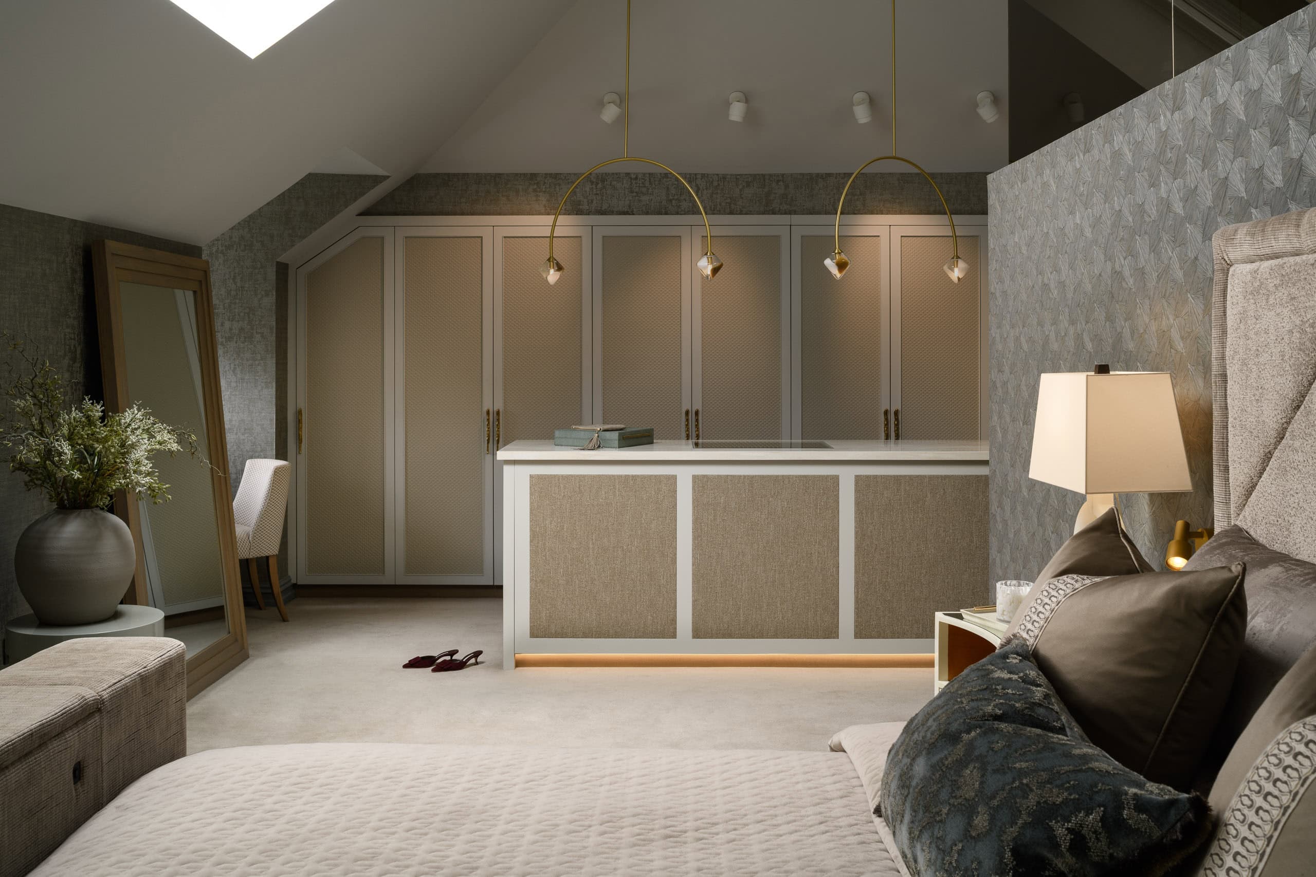 Modern bedroom with elegant decor and soft lighting, perfect for interior photography.