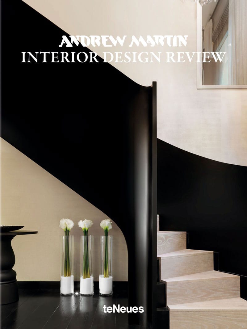 Modern interior staircase with black and white design elements.