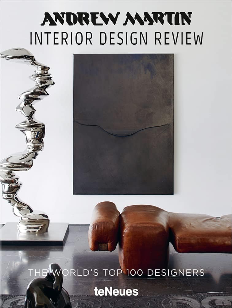 Modern interior design with abstract art and leather seating in a stylish room.